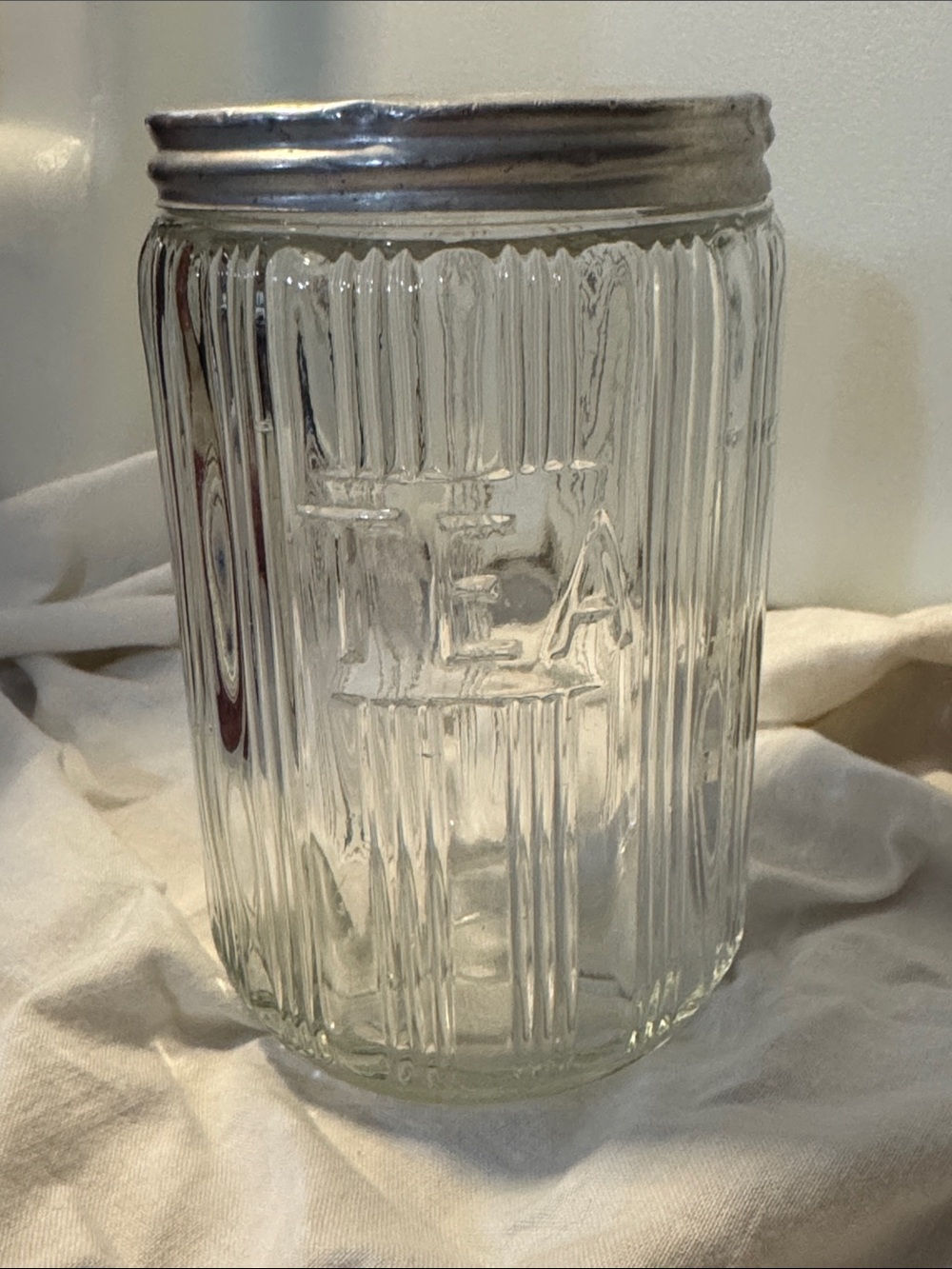 Hoosier Cabinet "Triple Skip" Patterned Jar with Silver-like Lid - TEA Embossed